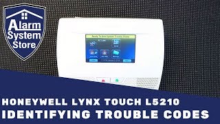 How To Clear Trouble Conditions On Honeywell Lynx L5210  AlarmSystemStore [upl. by Tsai]